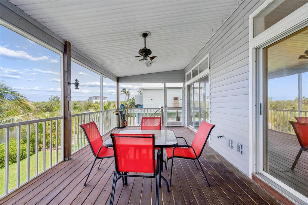 119 Burns Road Terra Ceia, FL 34250 - Photo 64 of 100 a view of a dining room with furniture window and outside view