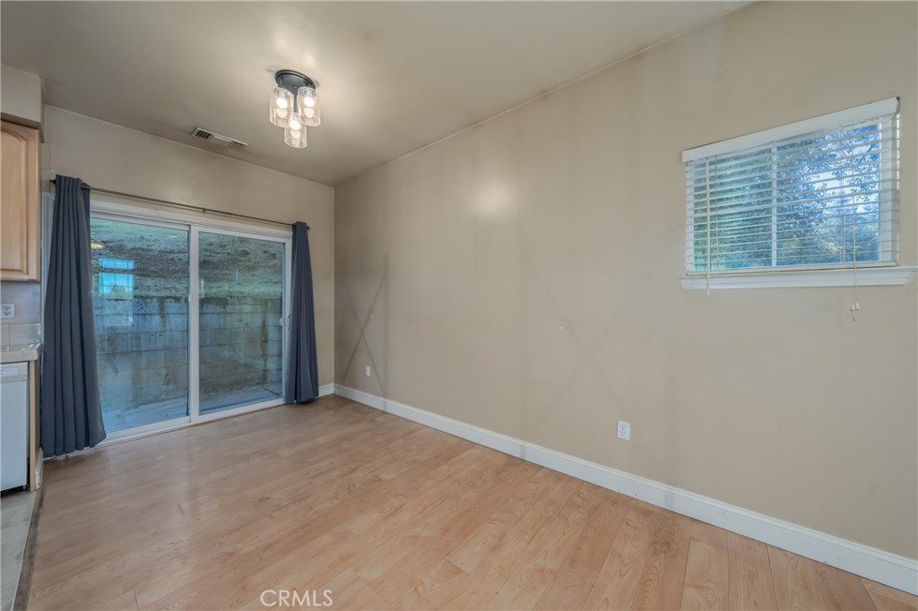 10401 Point Lakeview Road Kelseyville, CA 95451 - Photo 17 of 41 a view of an empty room with a window
