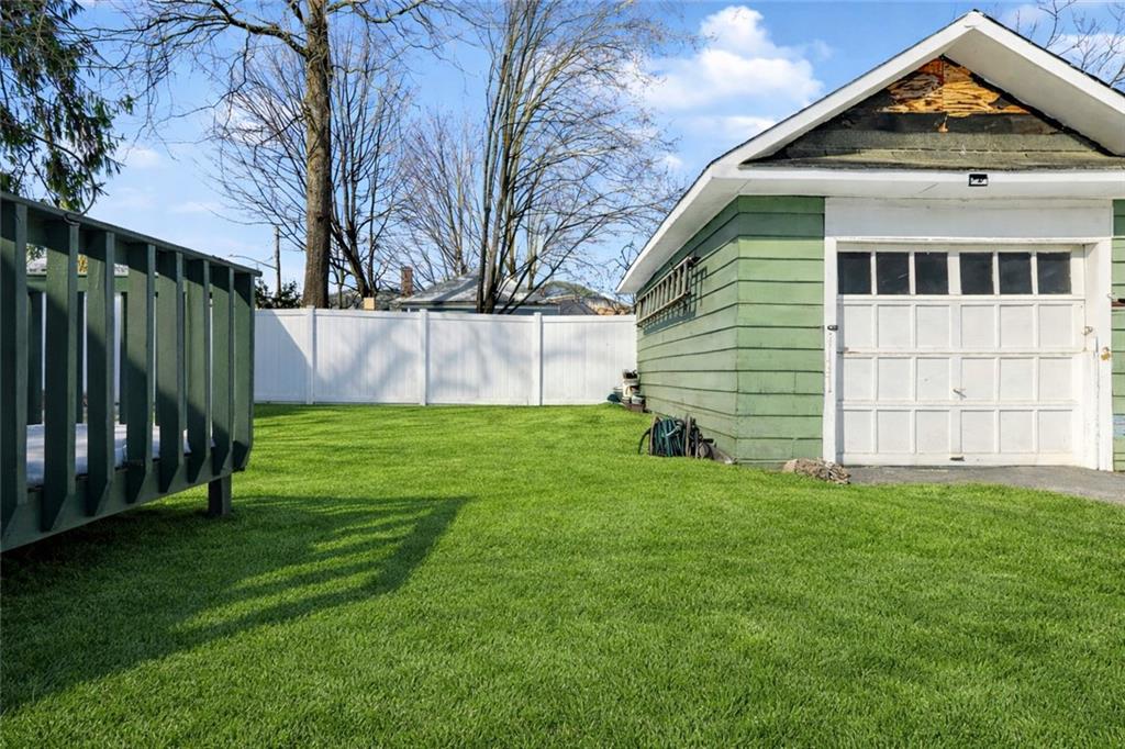 119 Watchogue Road Staten Island, NY 10314 - Photo 26 of 26 front view of a house with a yard