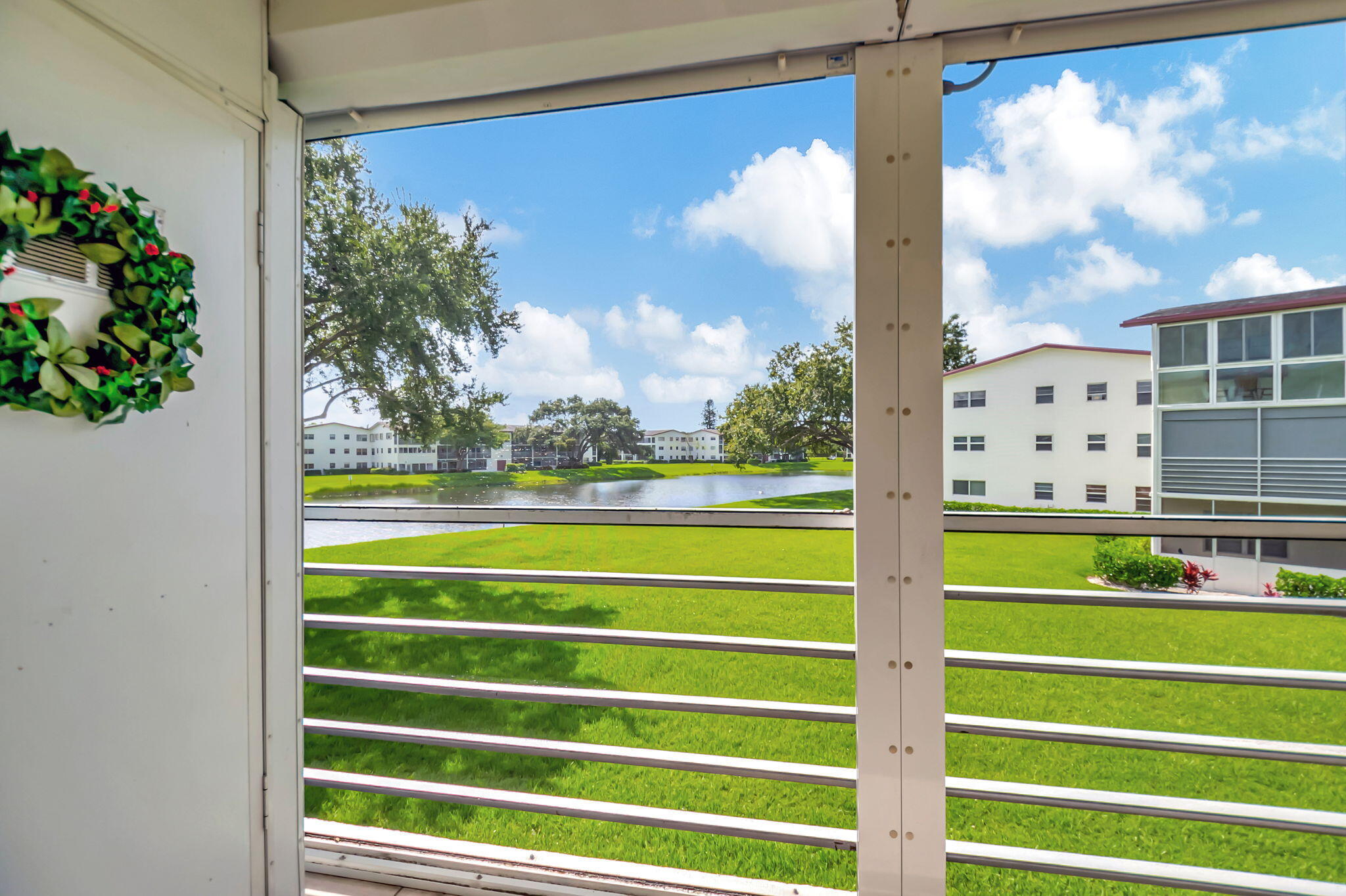 28 Fanshaw A Boca Raton, FL 33434 - Photo 17 of 63 a view of a city street from a window