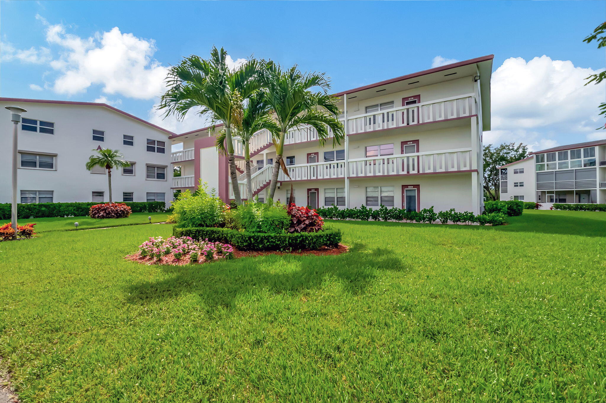 28 Fanshaw A Boca Raton, FL 33434 - Photo 23 of 63 a front view of building with yard