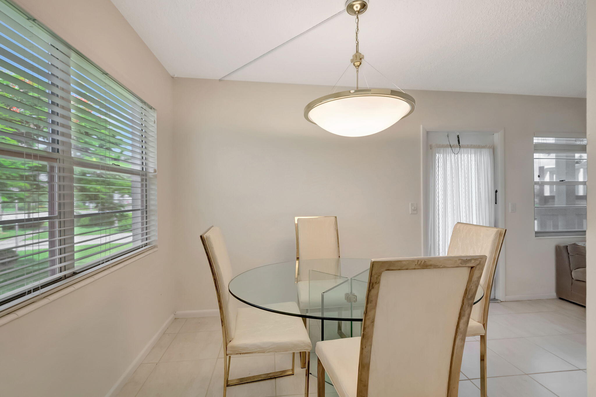 28 Fanshaw A Boca Raton, FL 33434 - Photo 5 of 63 a view of a dining room with furniture window and outside view