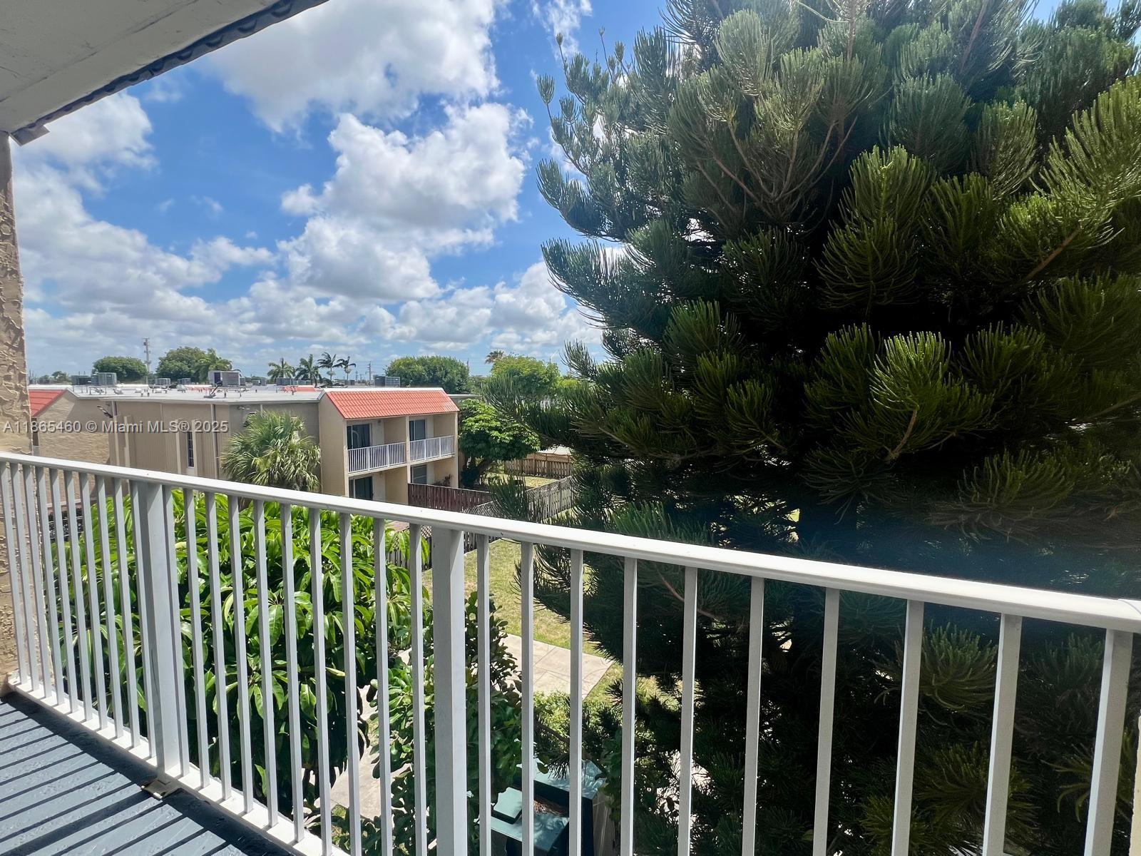 4810 Northwest 79th Avenue, Unit 305 Doral, FL 33166 - Photo 13 of 28 a view of city from a balcony