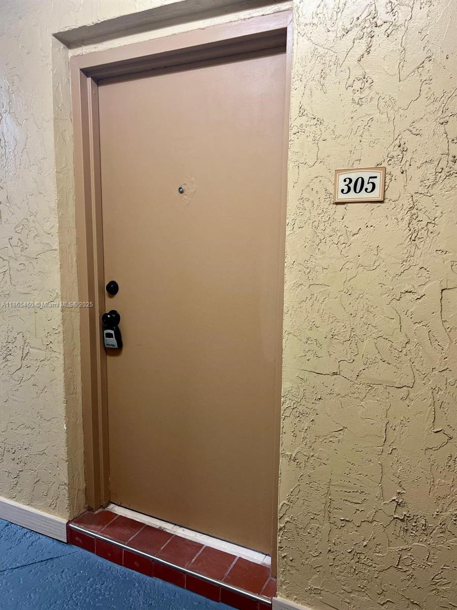 4810 Northwest 79th Avenue, Unit 305 Doral, FL 33166 - Photo 14 of 28 a view of door
