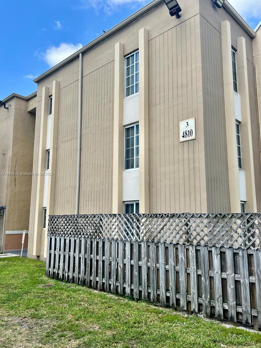 4810 Northwest 79th Avenue, Unit 305 Doral, FL 33166 - Photo 19 of 28 a view of a porch with a backyard