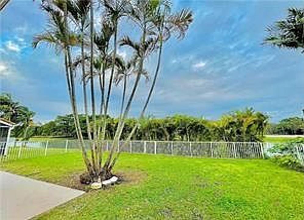 11041 Harbour Springs Circle Boca Raton, FL 33428 - Photo 15 of 15 a view of a garden