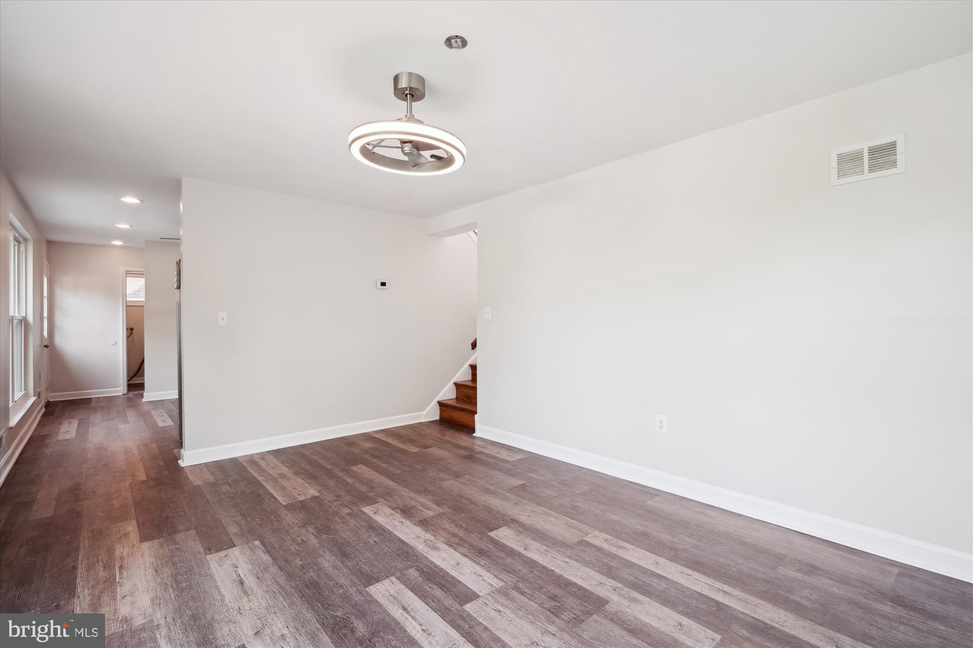 12812 Crisfield Road Silver Spring, MD 20906 - Photo 15 of 83 a view of empty room with wooden floor