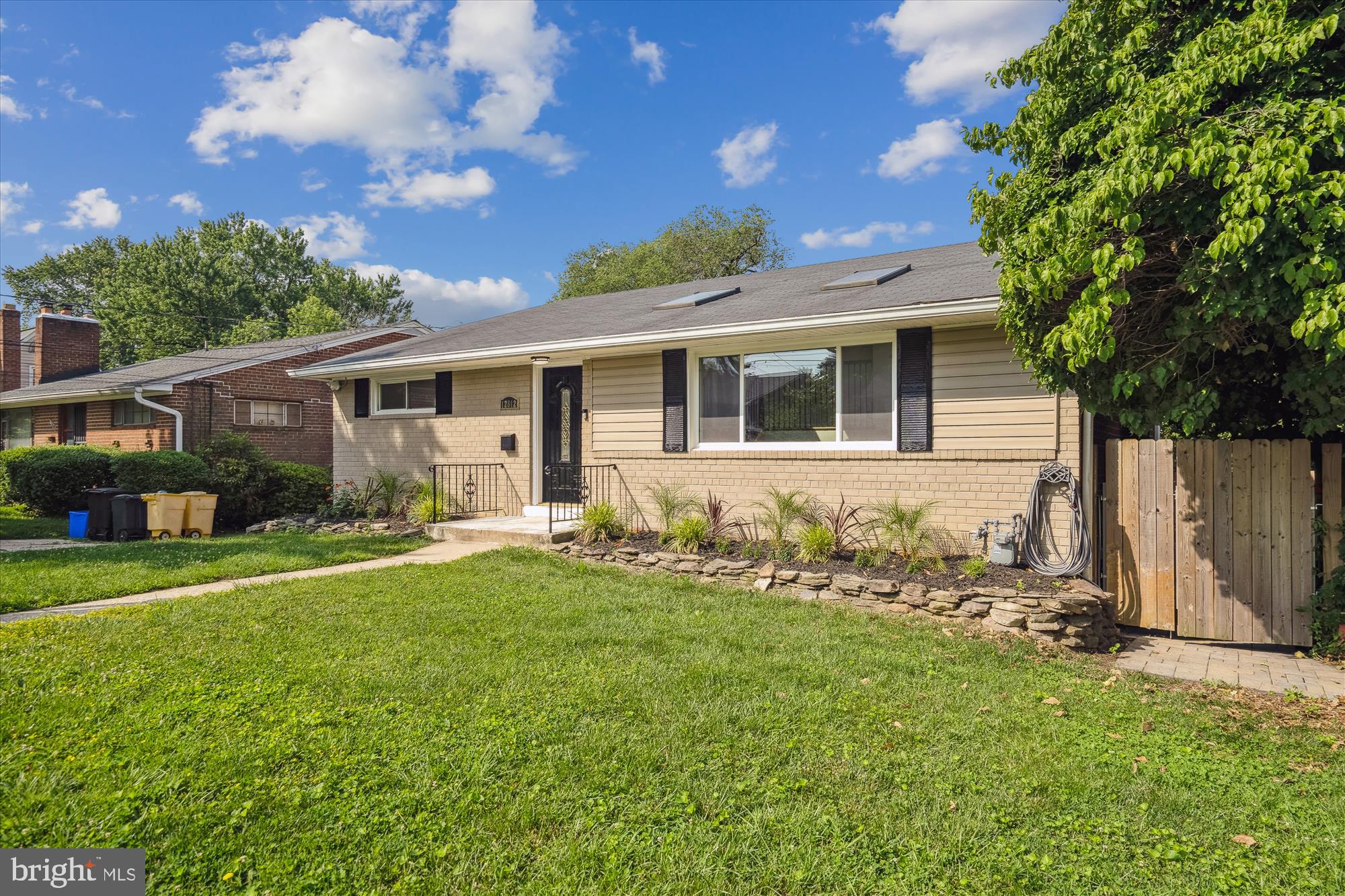 12812 Crisfield Road Silver Spring, MD 20906 - Photo 3 of 83 a front view of house with yard and green space