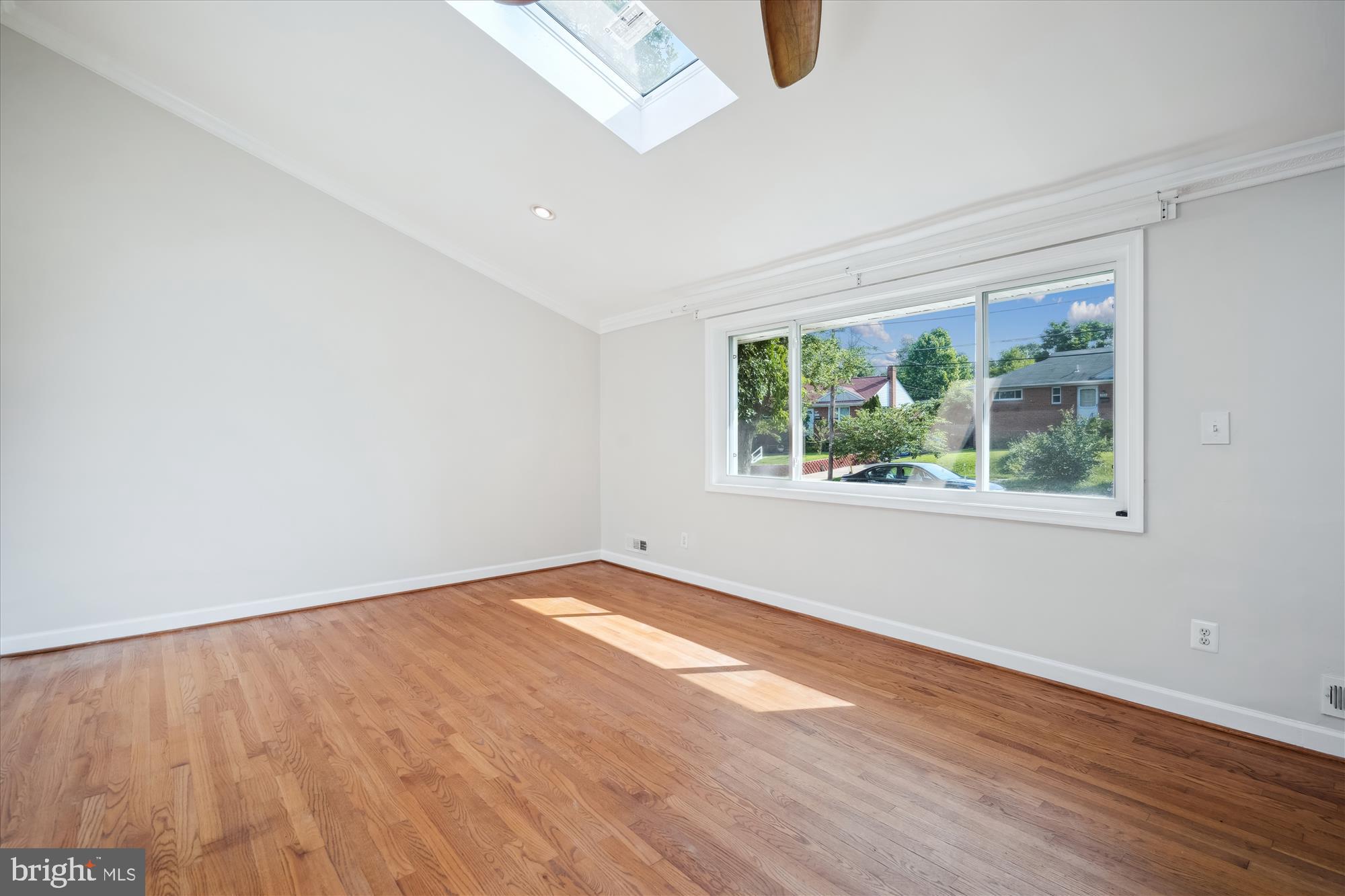 12812 Crisfield Road Silver Spring, MD 20906 - Photo 35 of 83 an empty room with wooden floor and windows