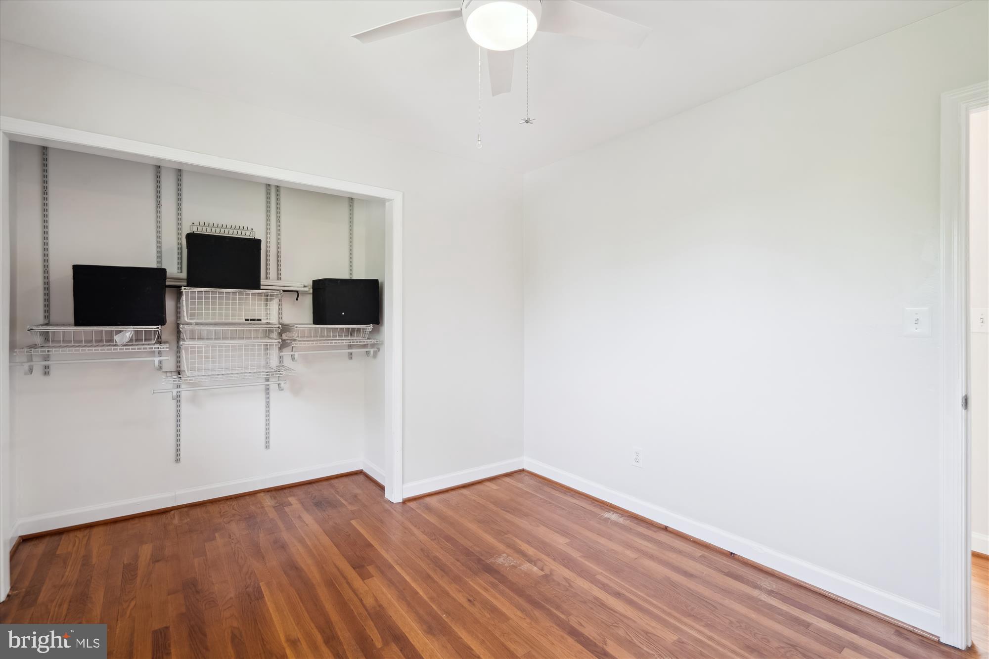 12812 Crisfield Road Silver Spring, MD 20906 - Photo 51 of 83 a view of a kitchen with wooden floor and electronic appliances