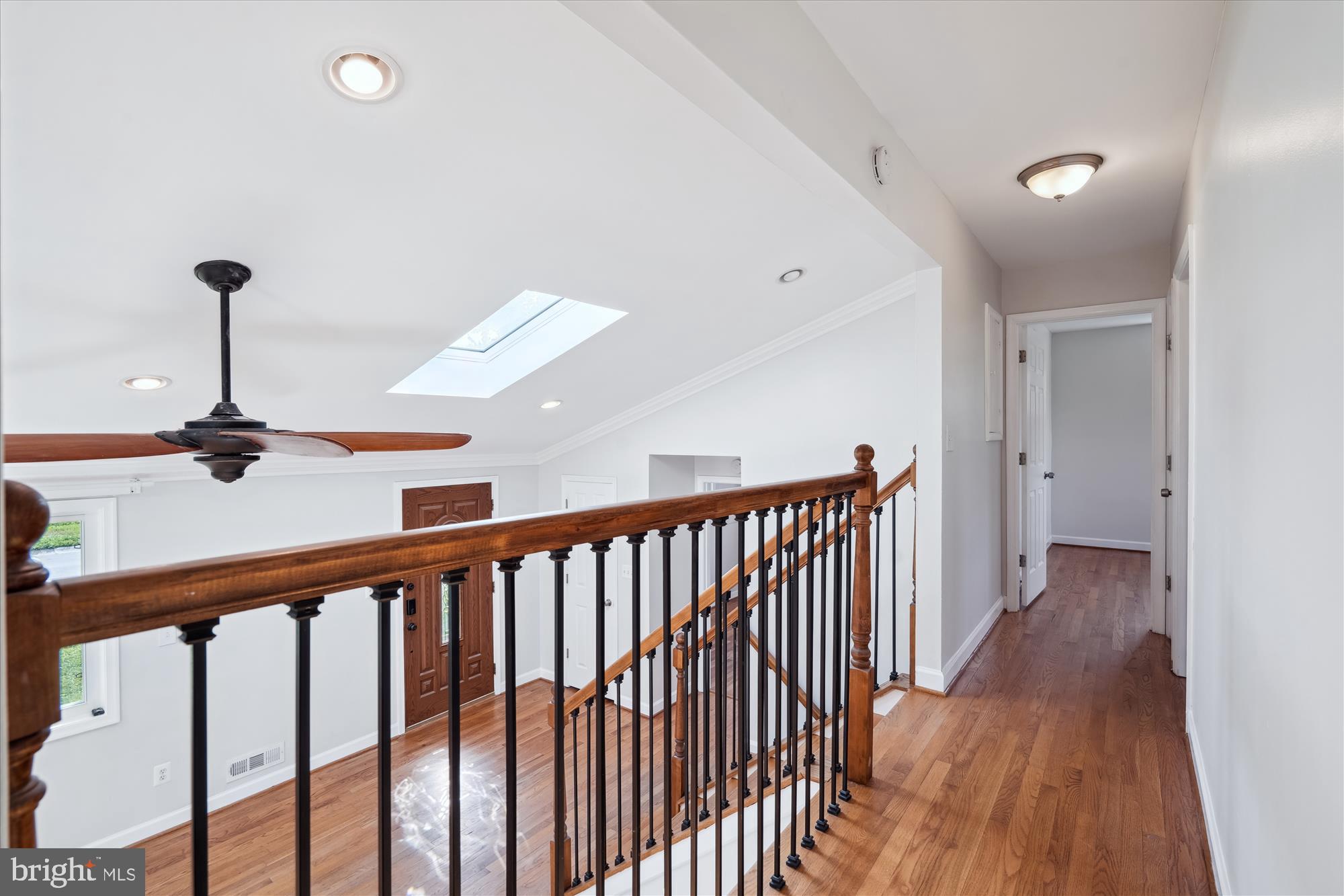 12812 Crisfield Road Silver Spring, MD 20906 - Photo 53 of 83 a view of a hallway with a hardwood floor