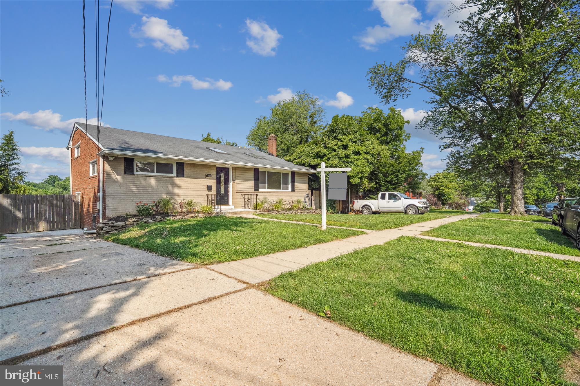 12812 Crisfield Road Silver Spring, MD 20906 - Photo 6 of 83 a front view of house with yard and green space
