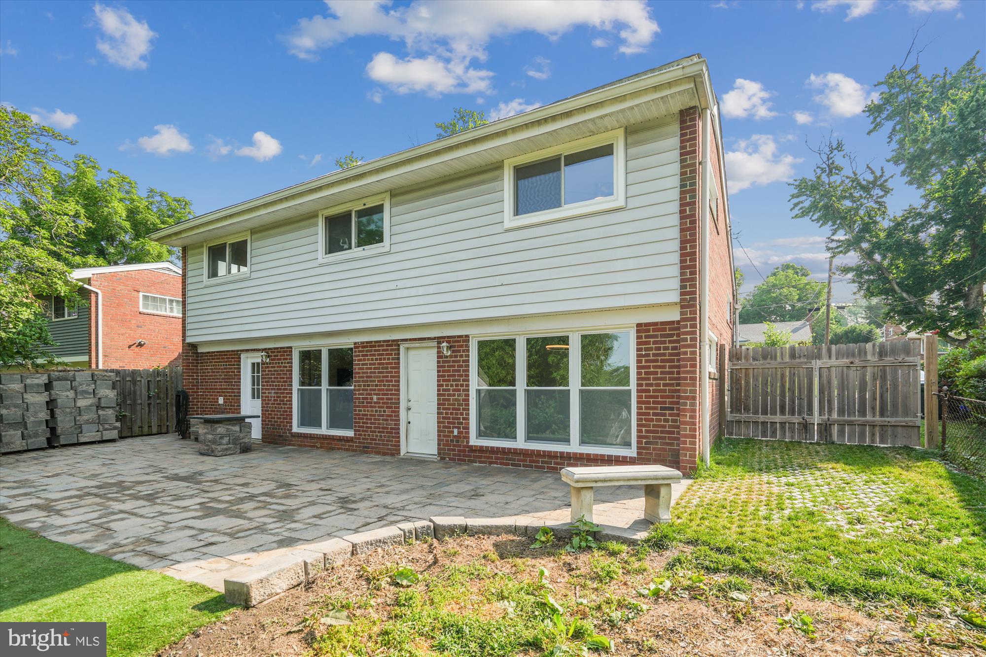 12812 Crisfield Road Silver Spring, MD 20906 - Photo 10 of 83 a front view of a house with a yard