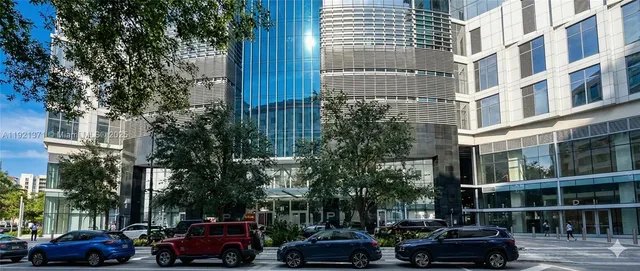 a cars parked in front of a building