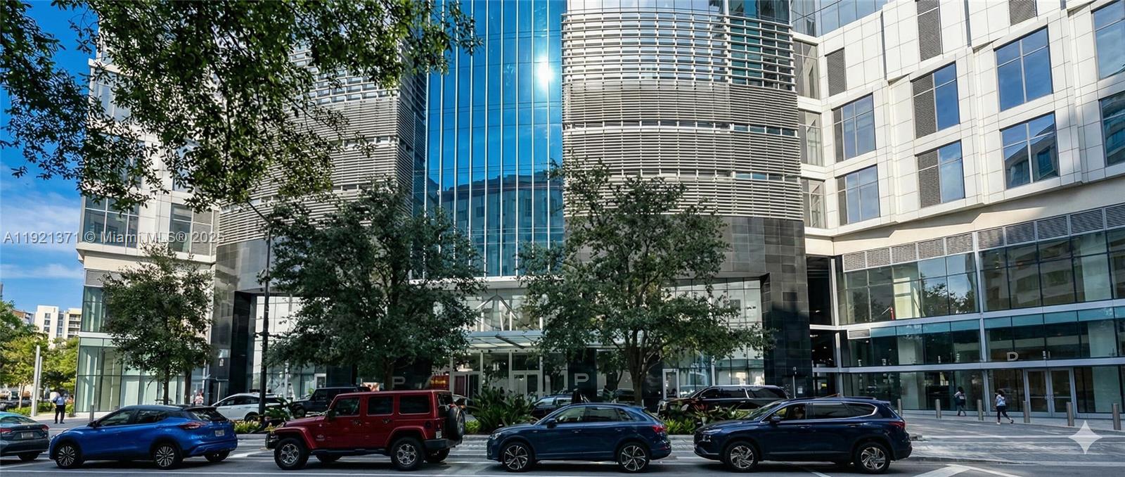 a cars parked in front of a building