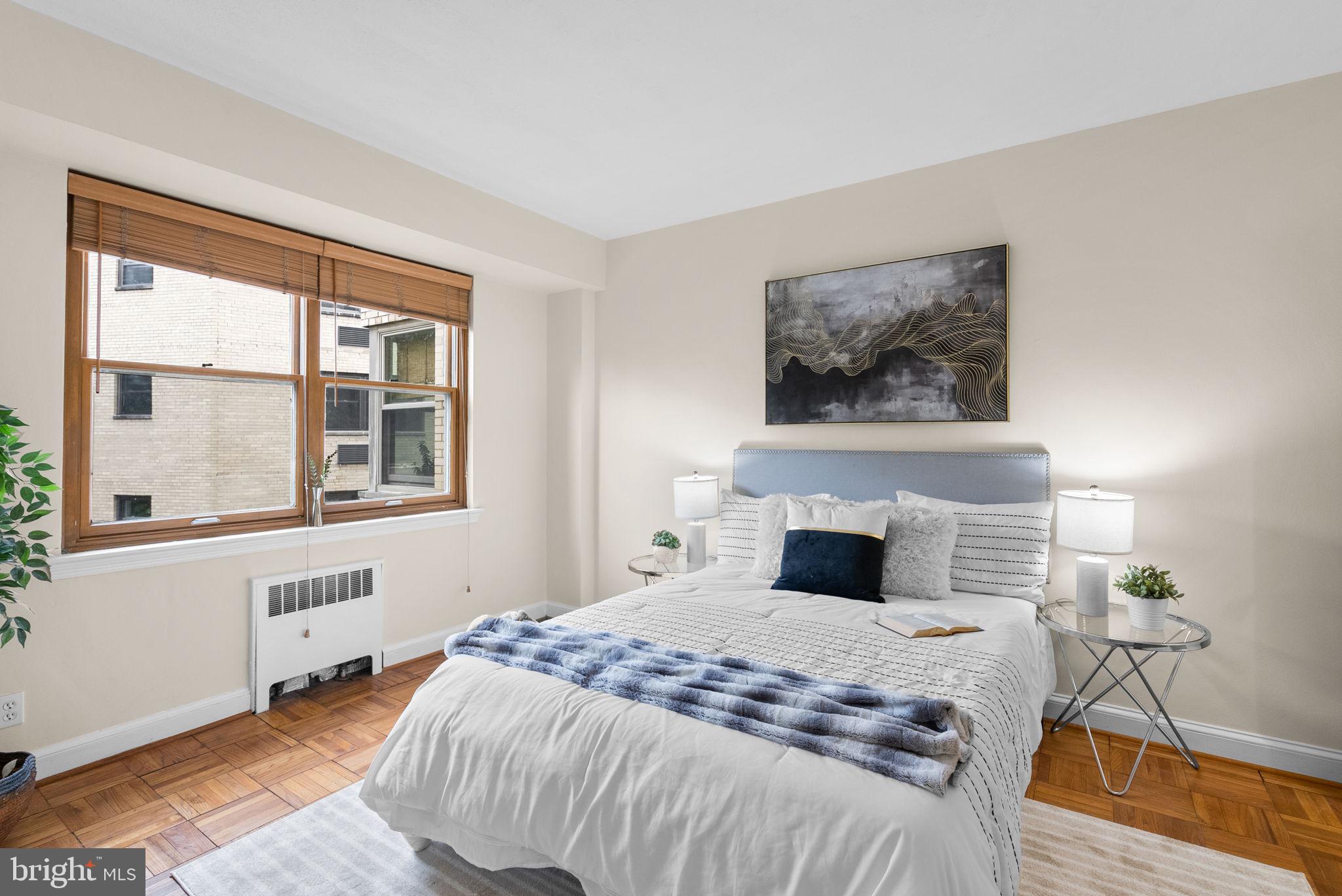 3025 Ontario Road Northwest, Unit 407 Washington, DC 20009 - Photo 23 of 28 Serene bedroom with natural light.
