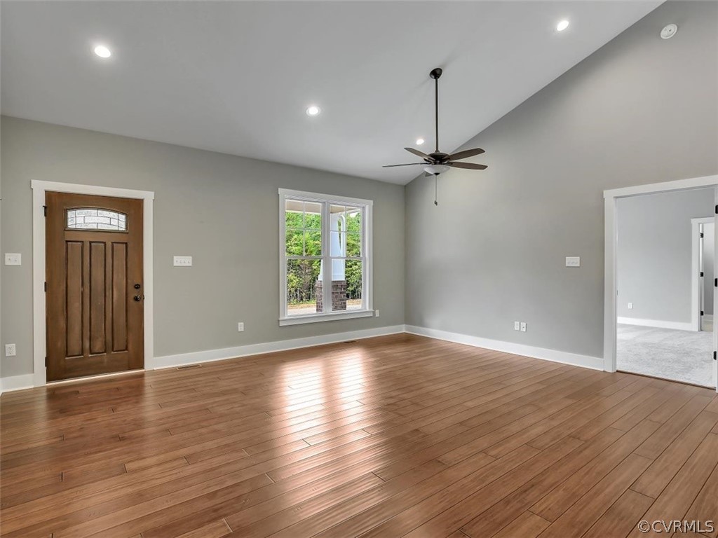 3793 Old Ridge Road Farmville, VA 23901 - Photo 12 of 27 an empty room with wooden floor and windows