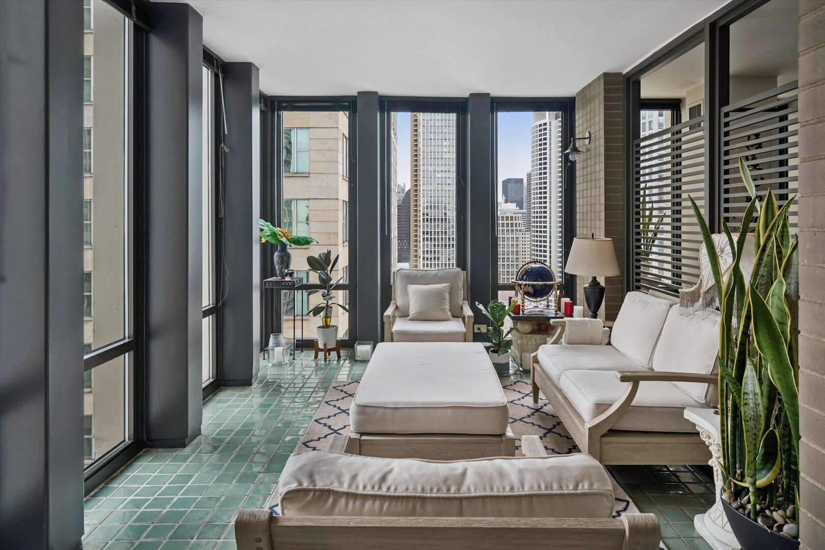 100 East Walton Street, Unit 41DE Chicago, IL 60611 - Photo 11 of 35 a living room with furniture and a floor to ceiling window