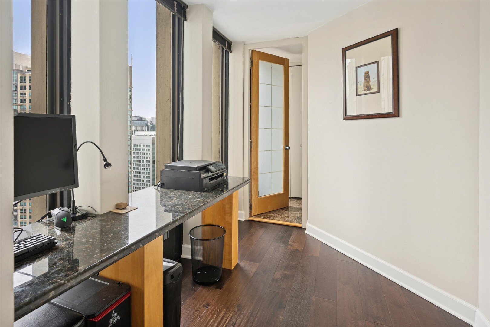 100 East Walton Street, Unit 41DE Chicago, IL 60611 - Photo 19 of 35 a room with wooden floor and furniture