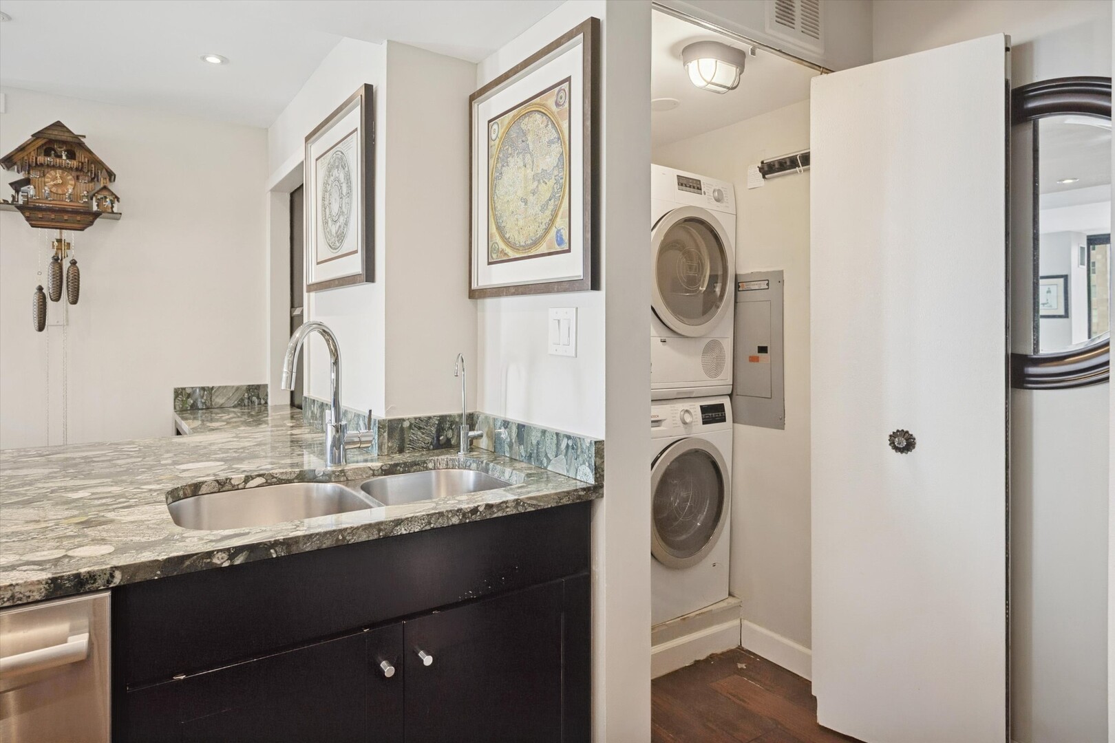 100 East Walton Street, Unit 41DE Chicago, IL 60611 - Photo 26 of 35 a bathroom with a granite countertop double vanity sink and a mirror
