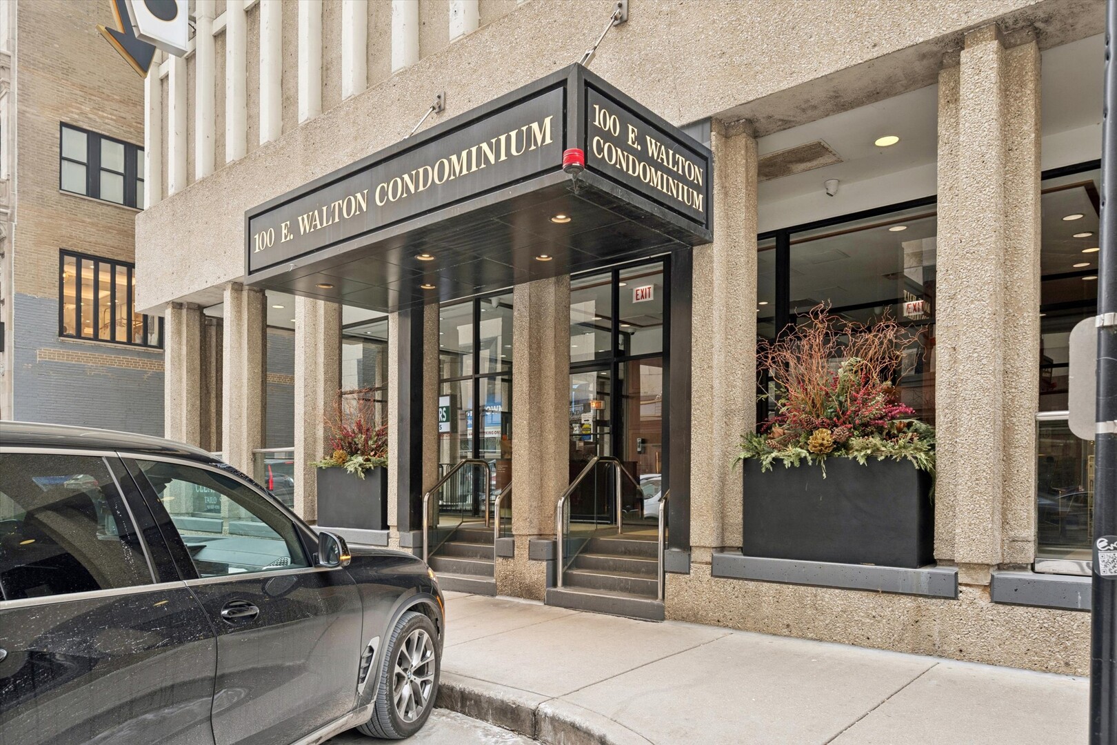 100 East Walton Street, Unit 41DE Chicago, IL 60611 - Photo 33 of 35 a view of a building with entryway