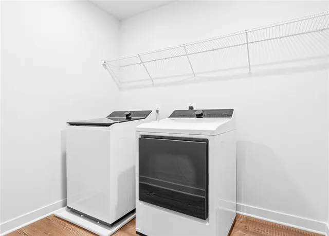 a utility room with dryer and washer