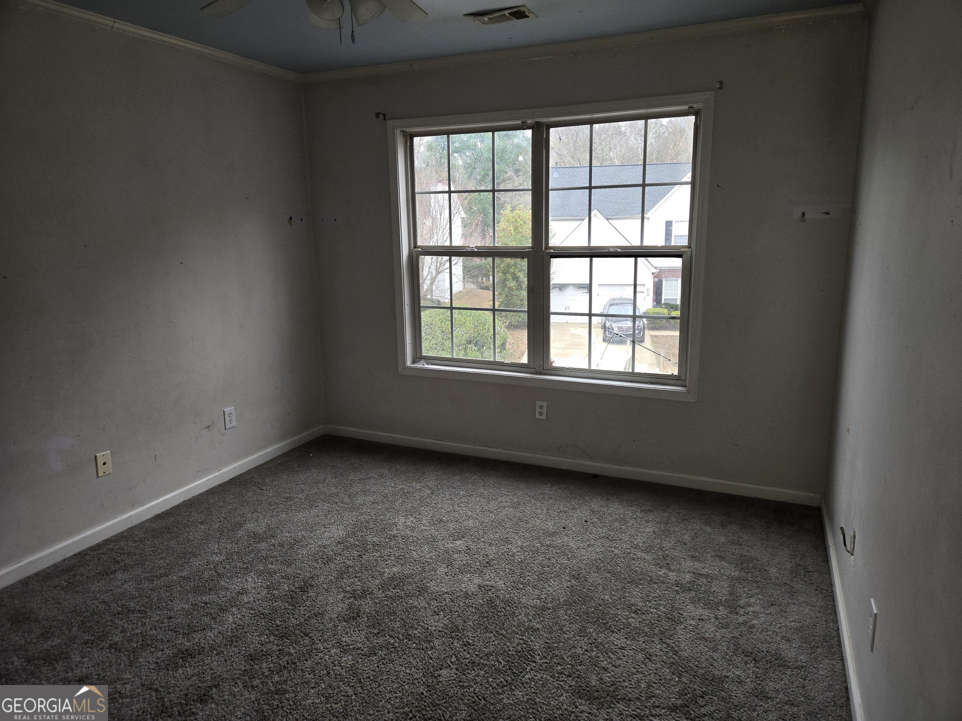 1558 Silver Ridge Drive Southwest Austell, GA 30106 - Photo 13 of 18 an empty room with a window
