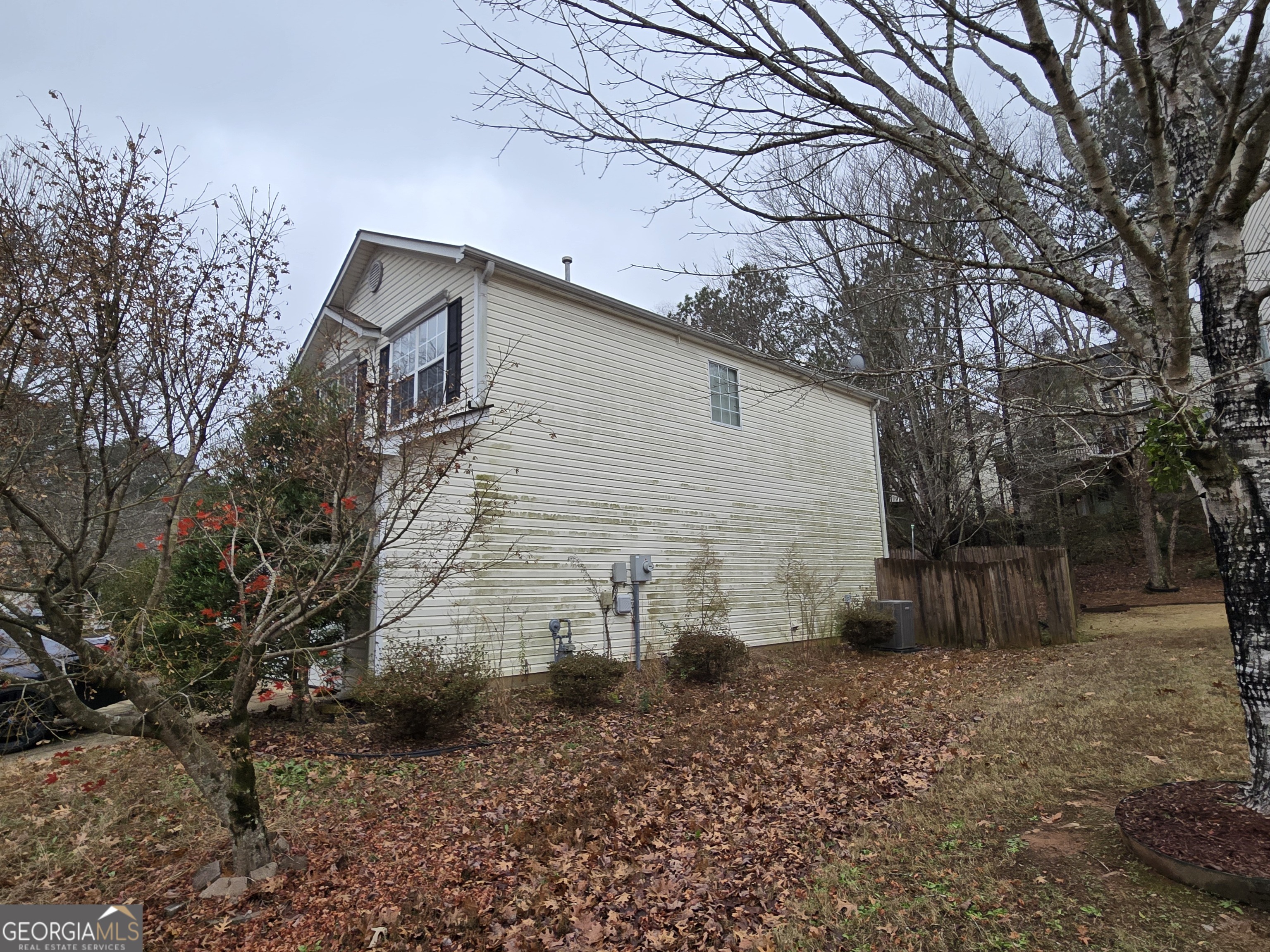 1558 Silver Ridge Drive Southwest Austell, GA 30106 - Photo 4 of 18 a view of a house with a yard