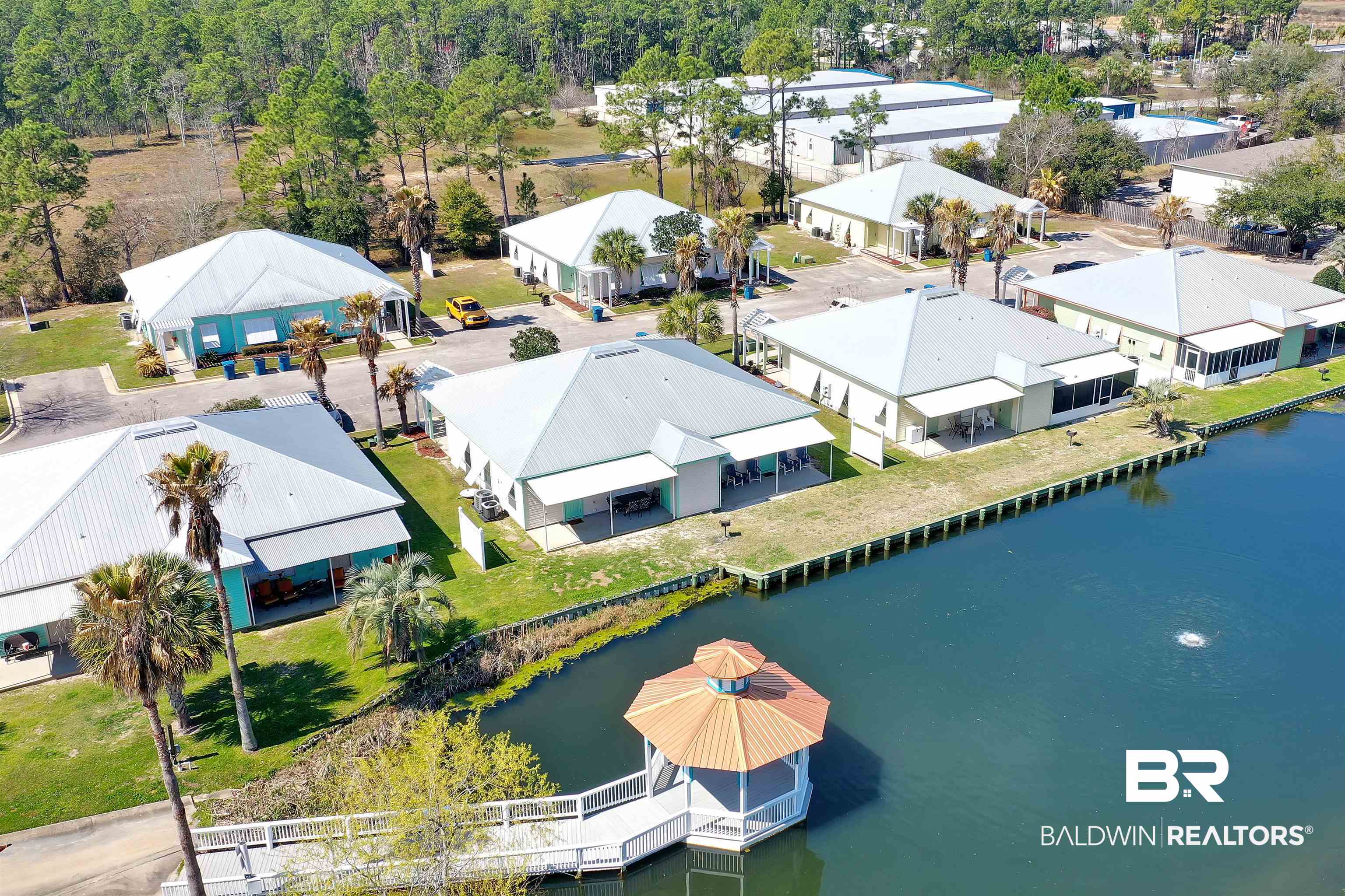 4324 B Lindsey Lane, Unit 4324B Orange Beach, AL 36561 - Photo 25 of 33 Birds eye view of property featuring a water view and a residential view