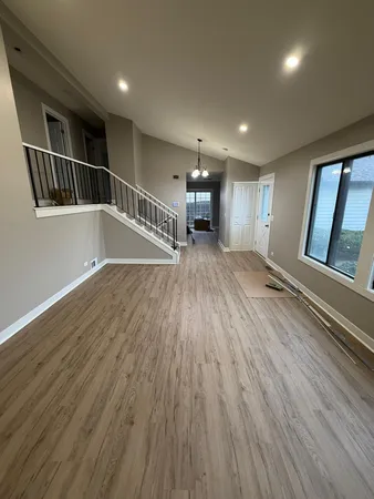 a view of entryway with wooden floor