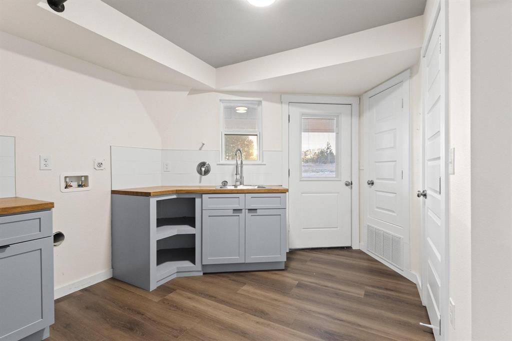 1325 Reynolds Road Whitewright, TX 75491 - Photo 25 of 39 a view of a kitchen from the hallway