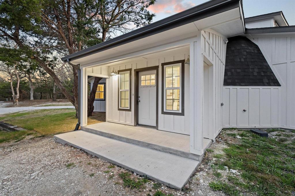 1325 Reynolds Road Whitewright, TX 75491 - Photo 4 of 39 a view of a house with backyard and porch