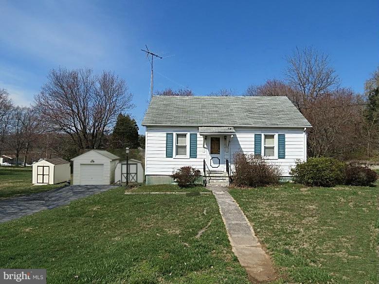 1650 Exeter Road Westminster, MD 21157 - Photo 1 of 18 a front view of a house with garden