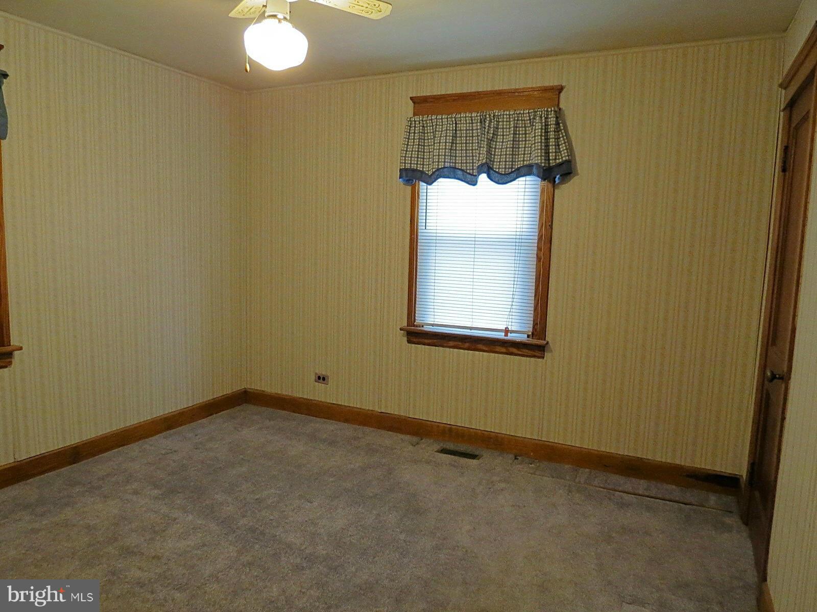 1650 Exeter Road Westminster, MD 21157 - Photo 12 of 18 an empty room with a window