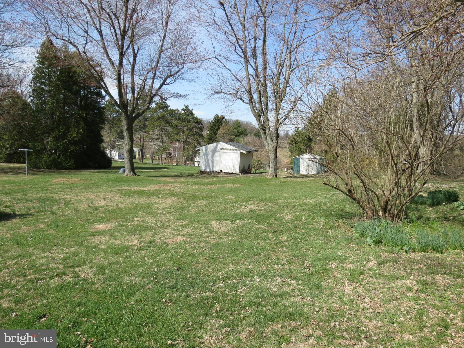 1650 Exeter Road Westminster, MD 21157 - Photo 18 of 18 a big yard with lots of green space and trees