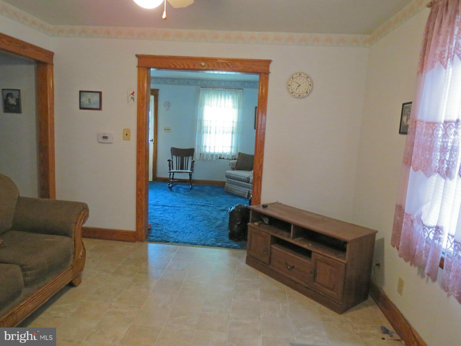 1650 Exeter Road Westminster, MD 21157 - Photo 7 of 18 a living room with furniture and a flat screen tv