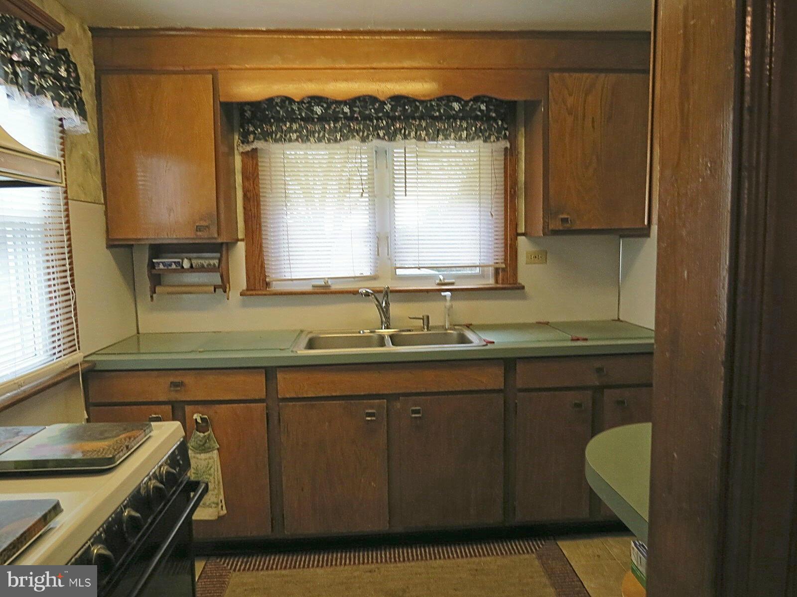 1650 Exeter Road Westminster, MD 21157 - Photo 8 of 18 a bathroom with a sink a mirror and a bathtub