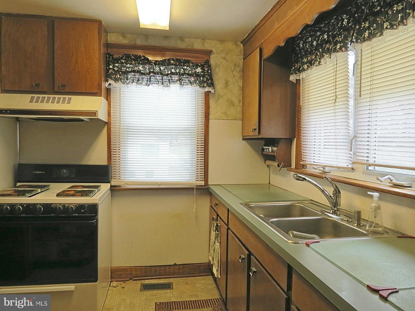 1650 Exeter Road Westminster, MD 21157 - Photo 9 of 18 a kitchen that has a sink and a stove