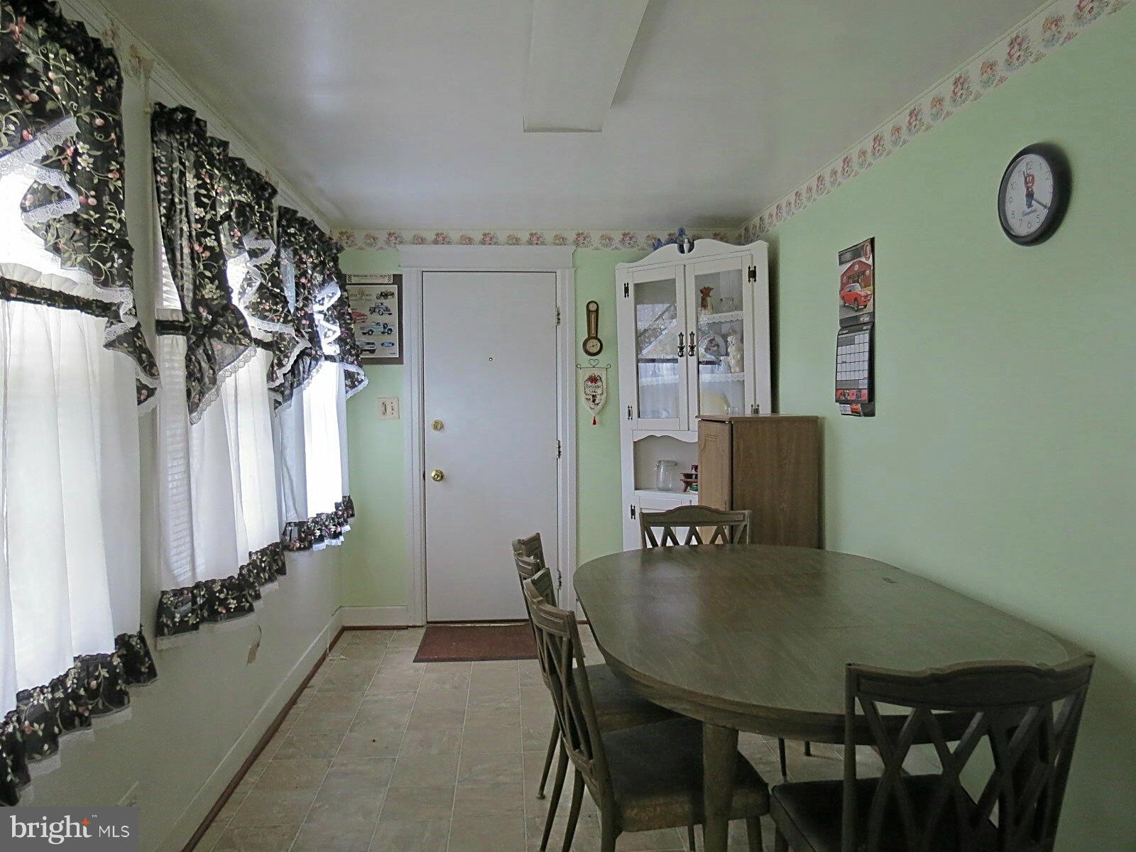 1650 Exeter Road Westminster, MD 21157 - Photo 10 of 18 a view of a dining room with furniture