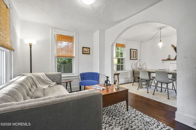 a living room with furniture and a couch