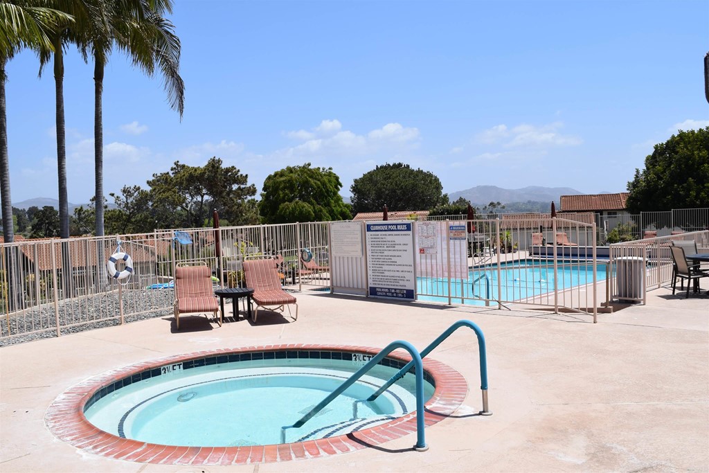 1723 Kellington Place Encinitas, CA 92024 - Photo 22 of 23 a view of a swimming pool with a lounge chair