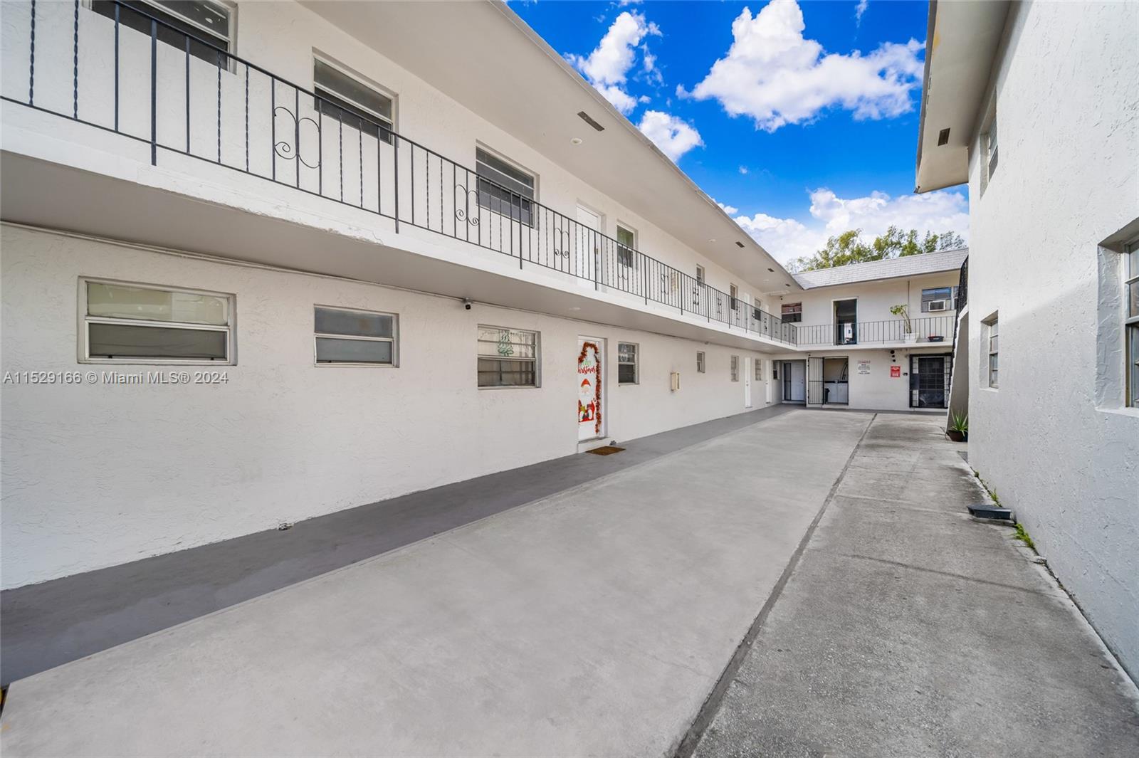 13240 Port Said Road Opa-Locka, FL 33054 - Photo 2 of 21 a view of a building