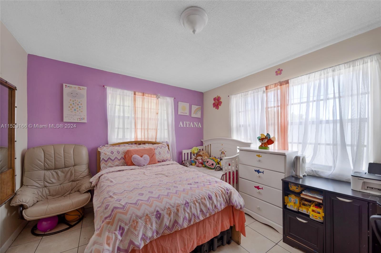 13240 Port Said Road Opa-Locka, FL 33054 - Photo 6 of 21 a bedroom with a bed and a window