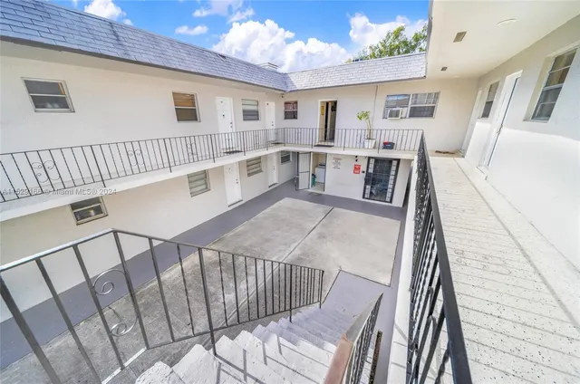 a view of a balcony with city view
