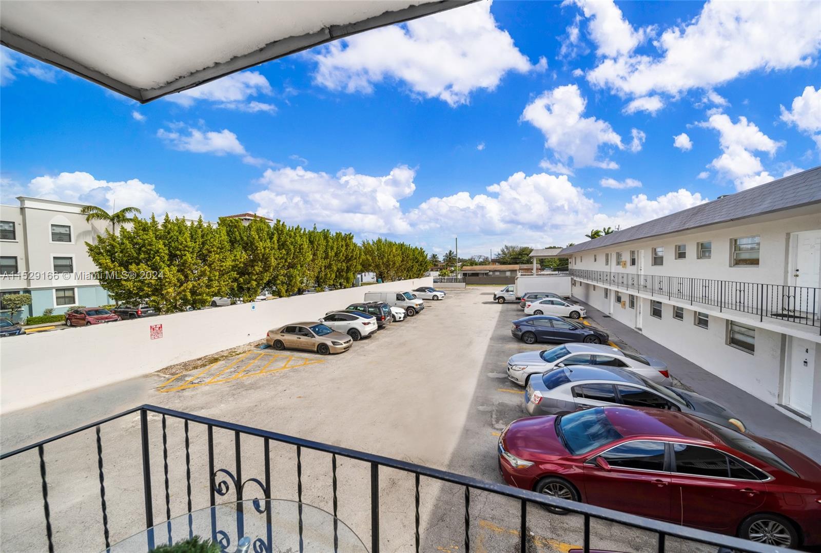 13240 Port Said Road Opa-Locka, FL 33054 - Photo 9 of 21 a view of a balcony with city view