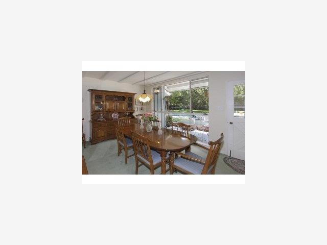 580 Middlefield Road Atherton, CA 94027 - Photo 4 of 9 a living room with furniture and a large window