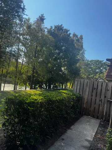 a view of backyard with green space