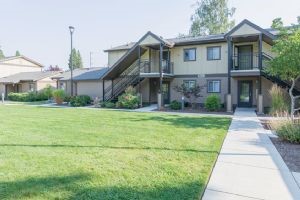 1108 South Rose Street, Unit 50 Phoenix, OR 97535 - Photo 2 of 10 a front view of house with yard and green space