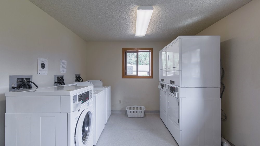 1108 South Rose Street, Unit 50 Phoenix, OR 97535 - Photo 10 of 10 a utility room with dryer and washer