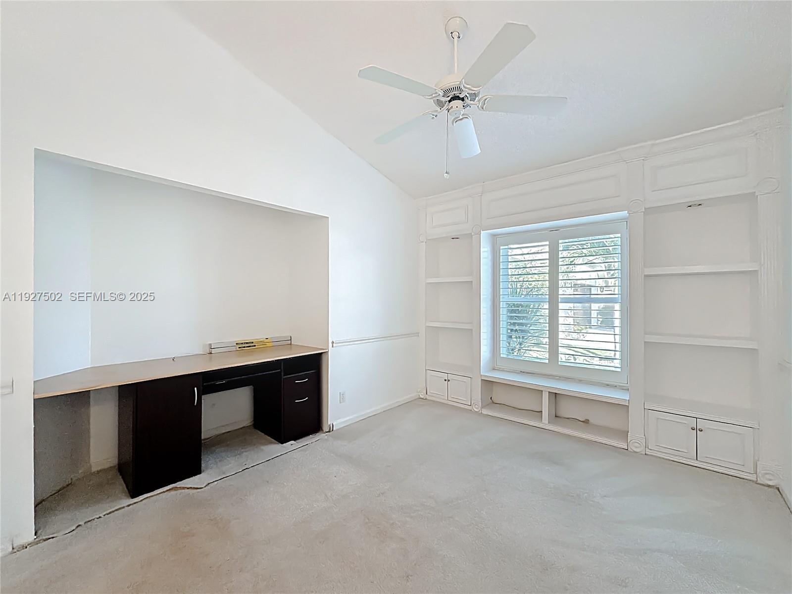 356 Hammocks Trail Greenacres, FL 33413 - Photo 20 of 41 a view of an empty room with a window
